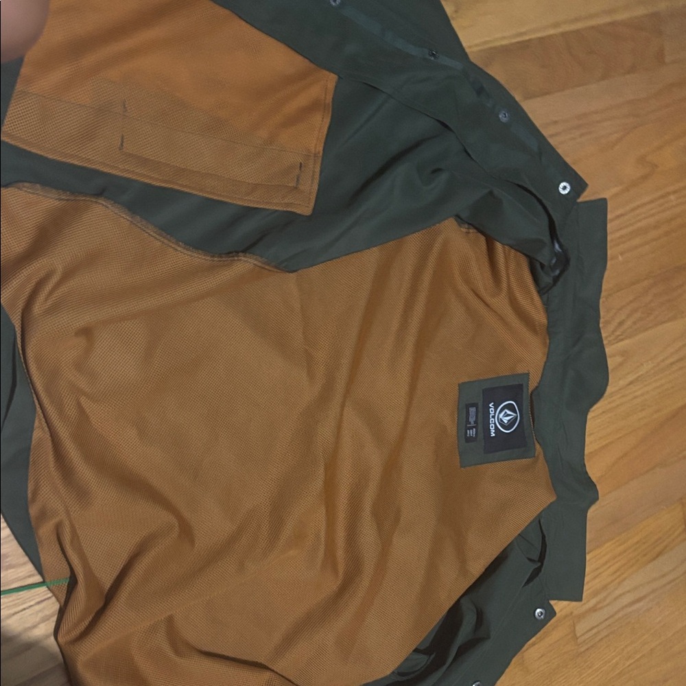 Volcom Men's Green and Brown Raincoat with a orange mesh interior